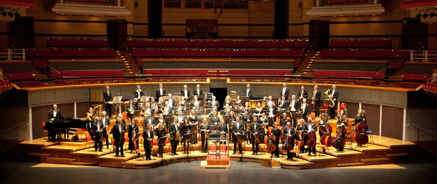 Royal Ballet Sinfonia playing on the stage at Symphony Hall, Birmingham