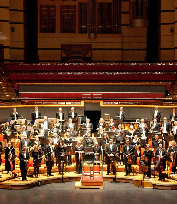 Royal Ballet Sinfonia playing on the stage at Symphony Hall, Birmingham