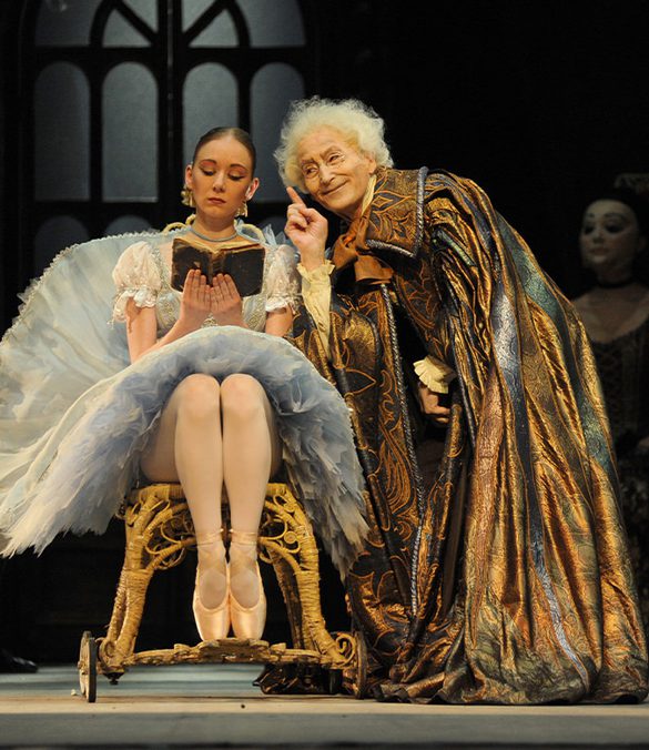 David Morse in the character of the Dr Coppélius, with Elisha Willis as Swanilda, in Coppélia