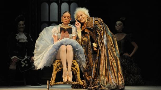 David Morse in the character of the Dr Coppélius, with Elisha Willis as Swanilda, in Coppélia