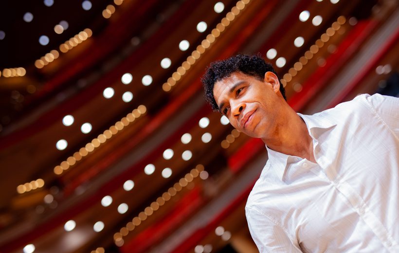 Carlos Acosta stands in the empty Symphony Hall auditorium